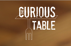 The Curious Table Logo